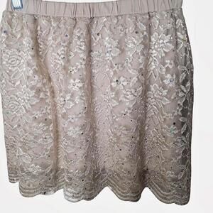 Fairy lace jeweled cream color lined mini skirt